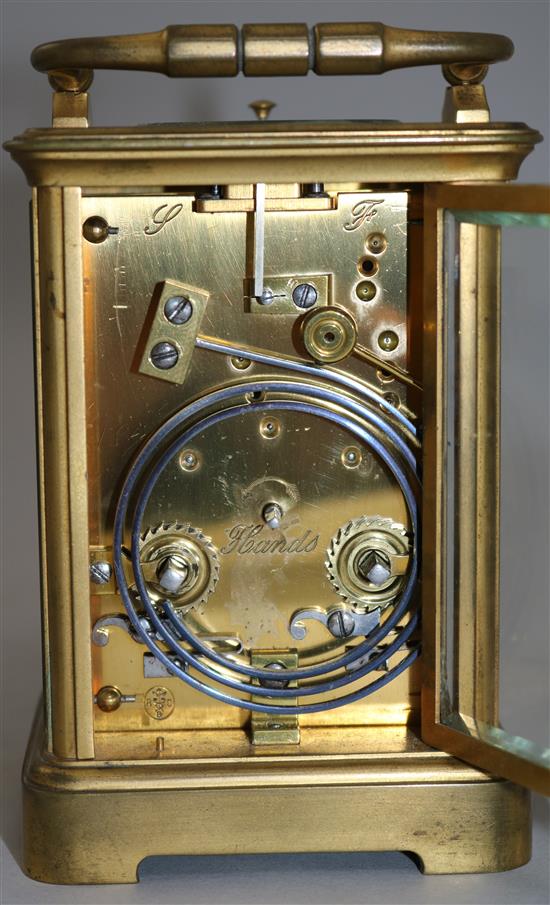 A French brass cased eight day repeating carriage clock, 4.75in ex. handle.
